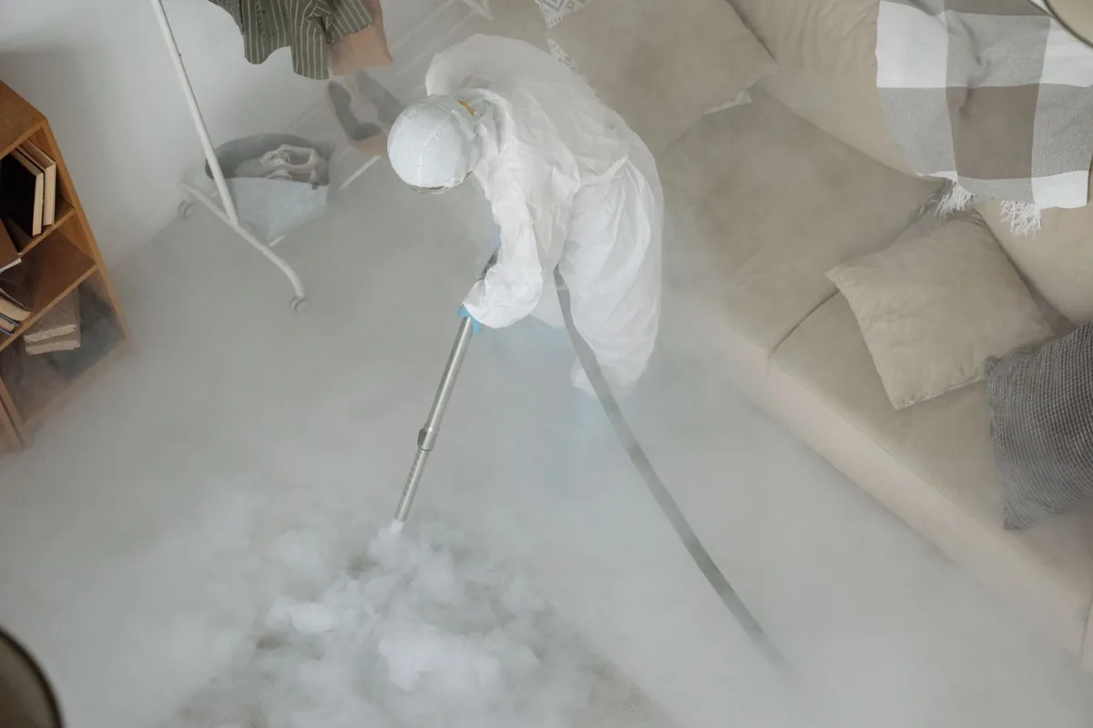 Biohazard cleanup technician in protective equipment, Redding, CA